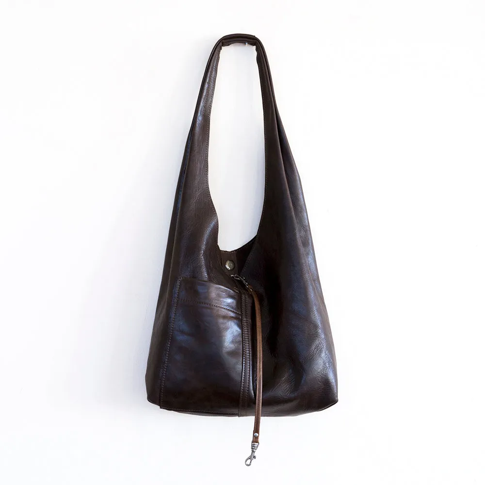 candid sling | outer pockets | small