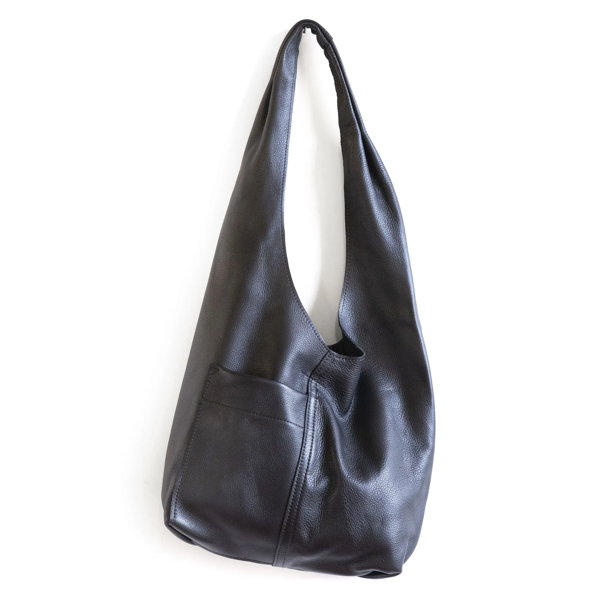 candid sling | outer pockets | small