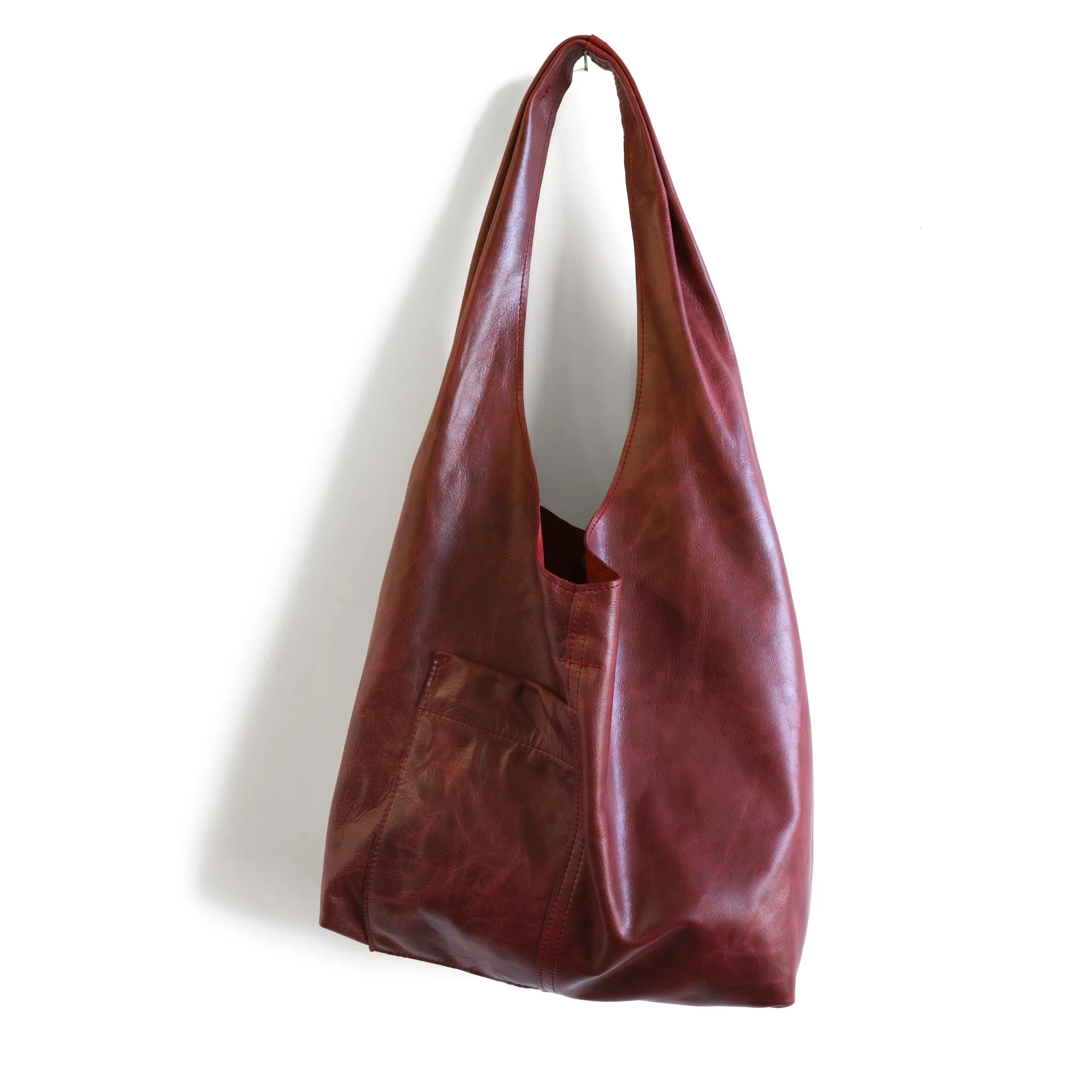 candid sling | outer pockets | small