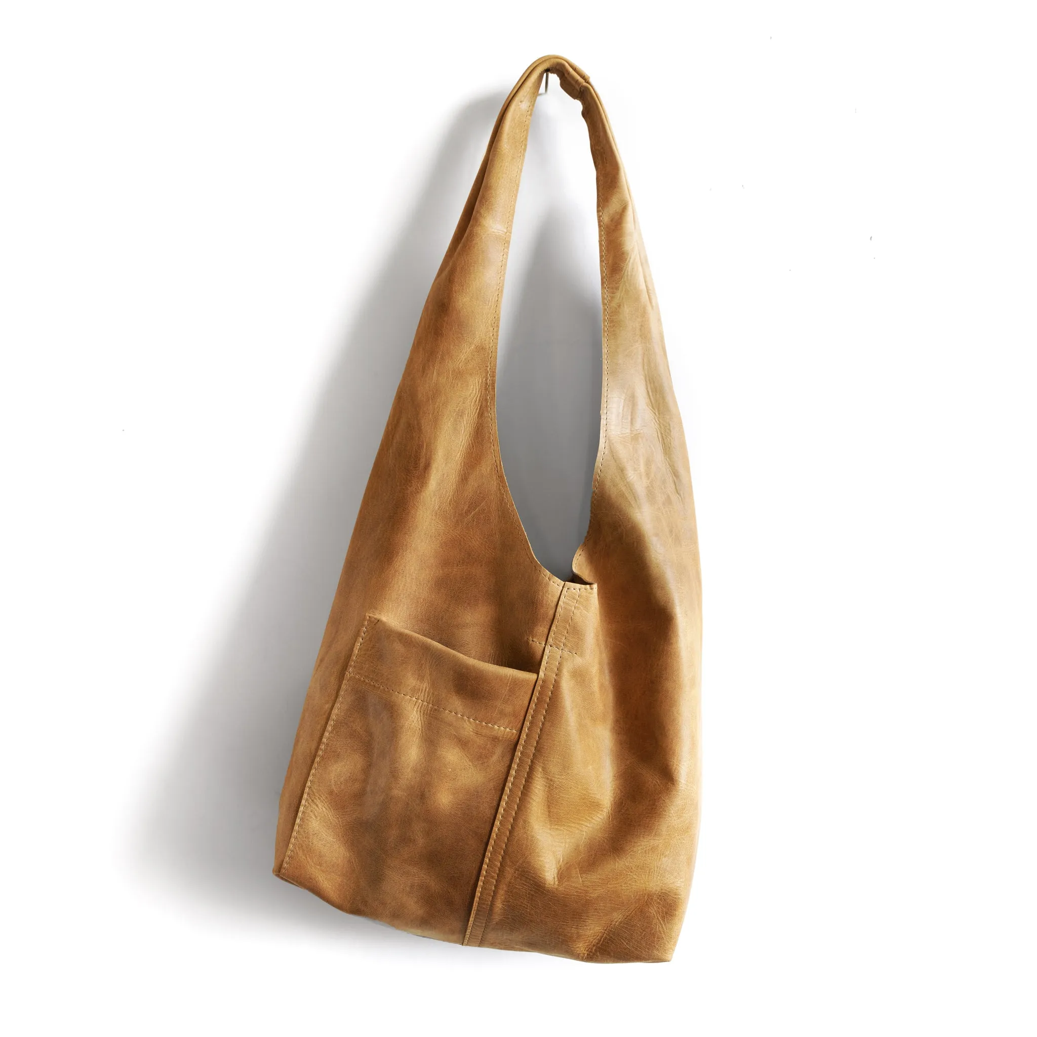 candid sling | outer pockets | small