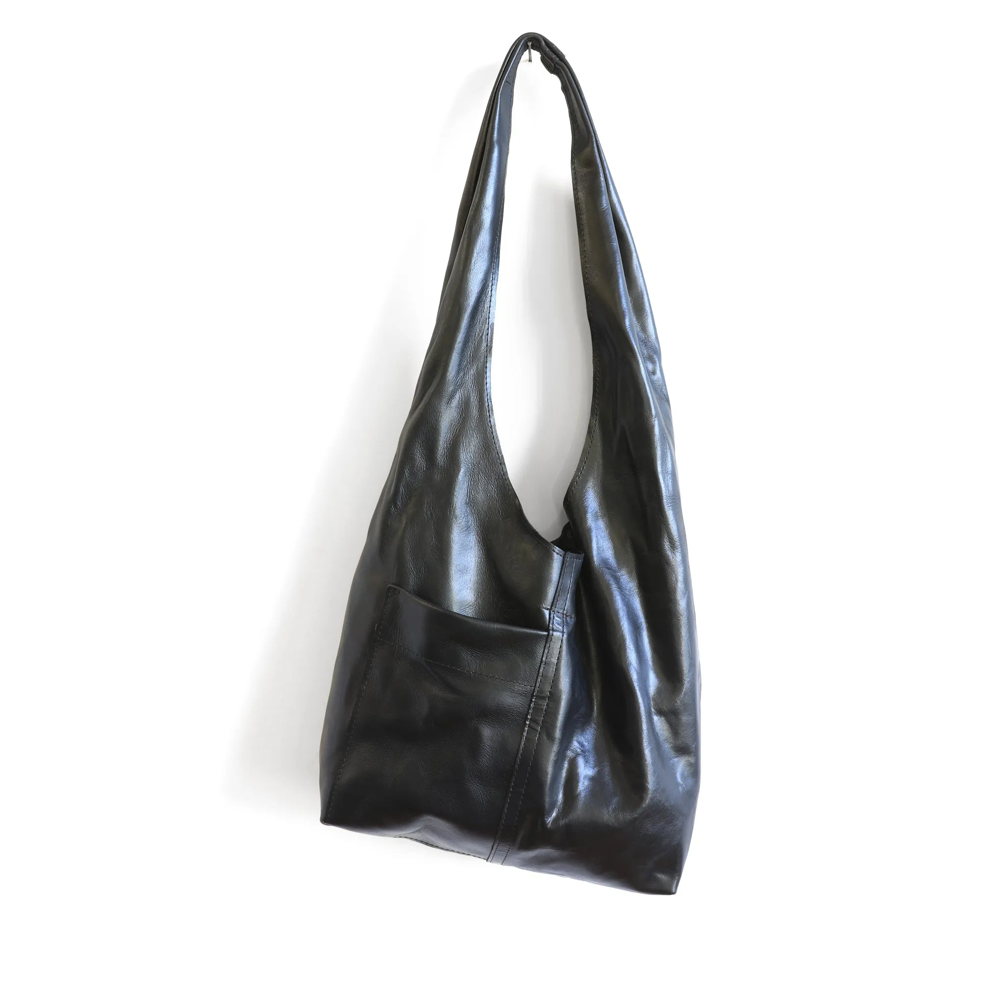 candid sling | outer pockets | small