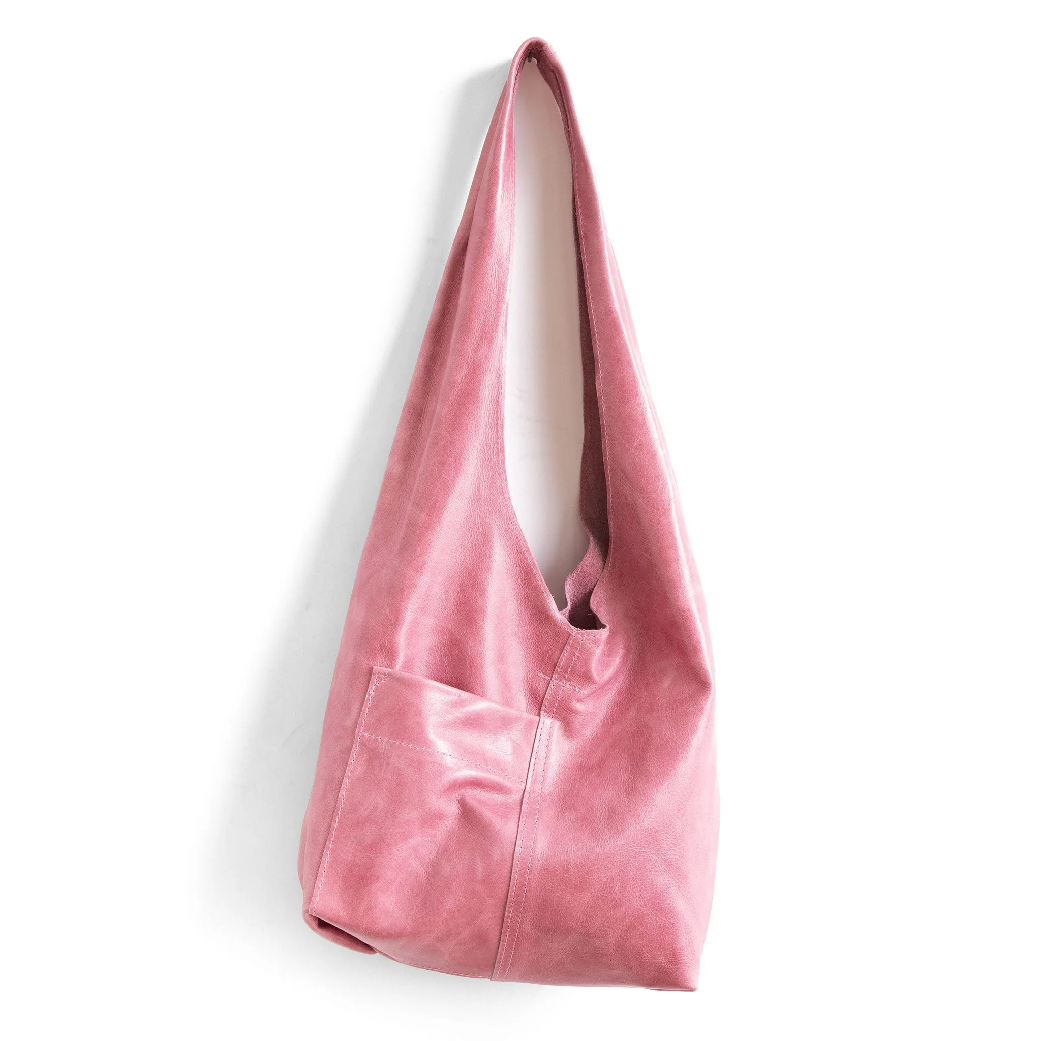candid sling | outer pockets | small