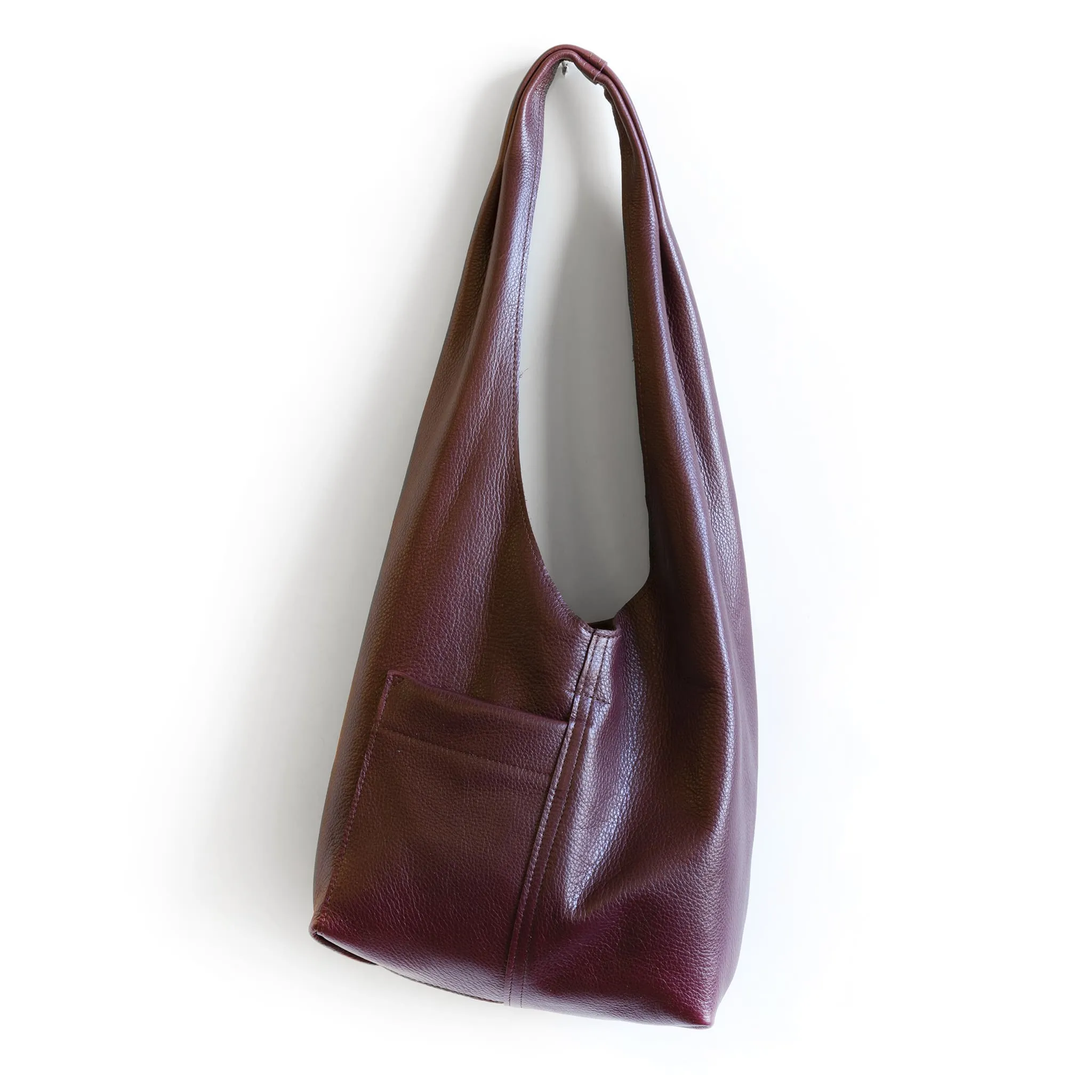 candid sling | outer pockets | small