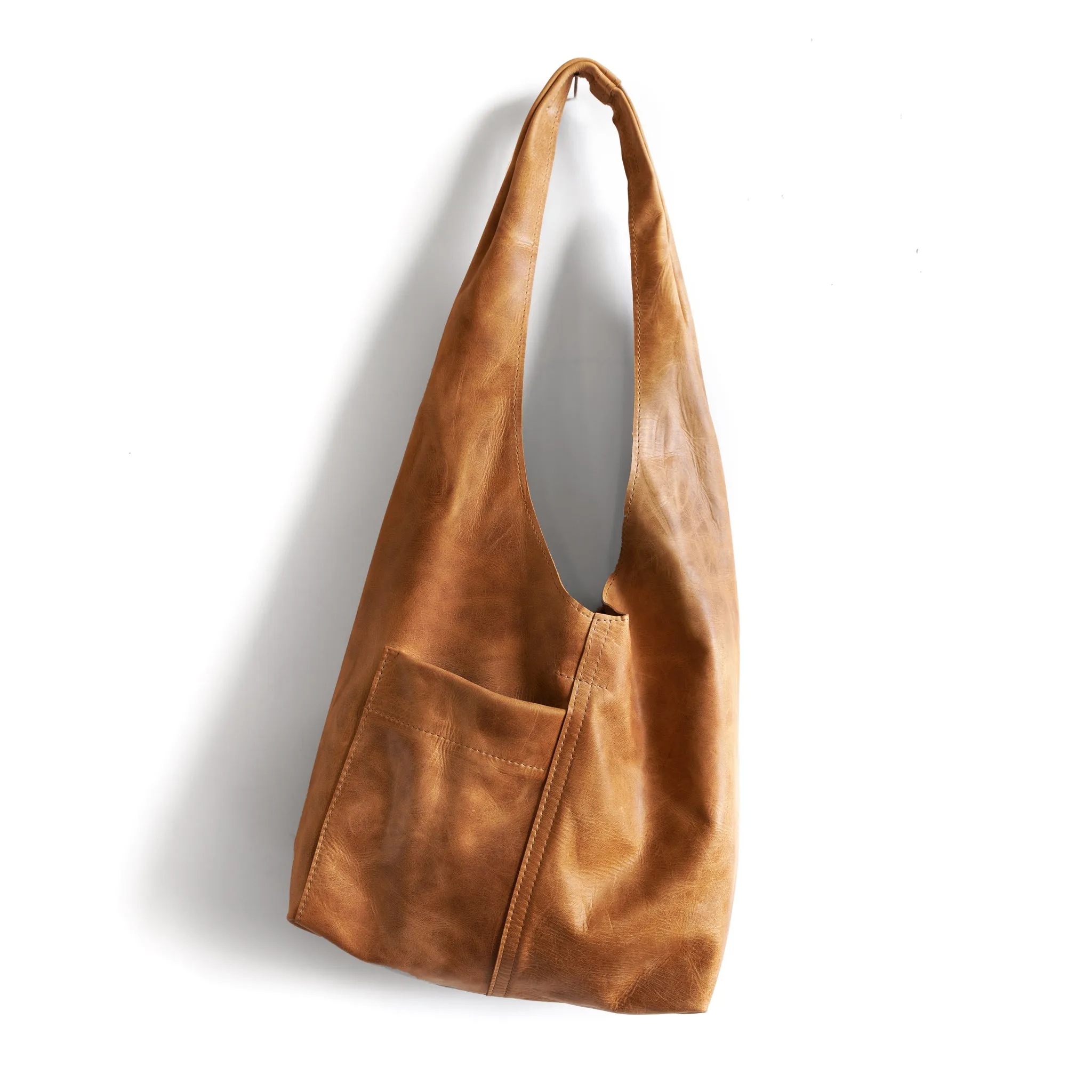 candid sling | outer pockets | small