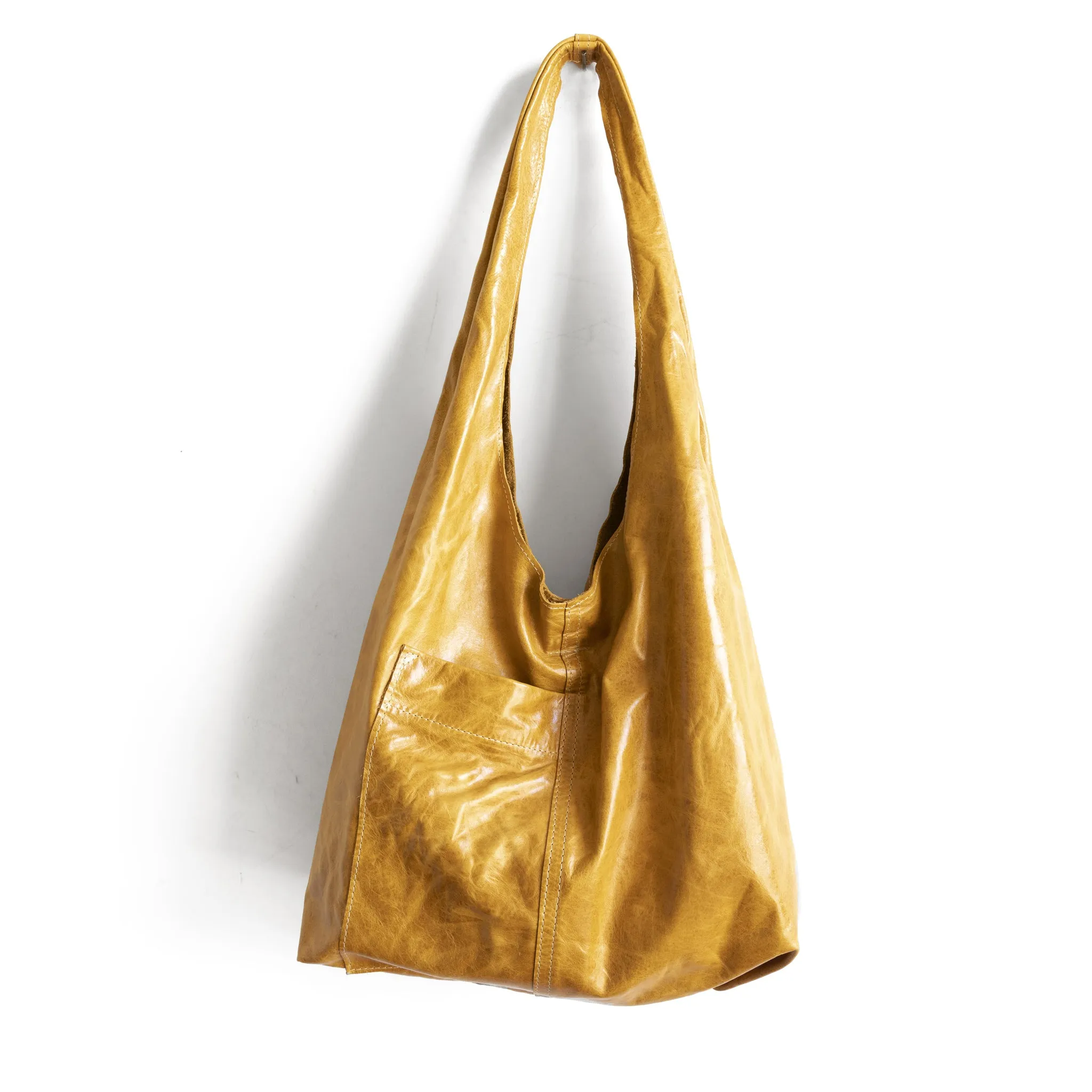 candid sling | outer pockets | small