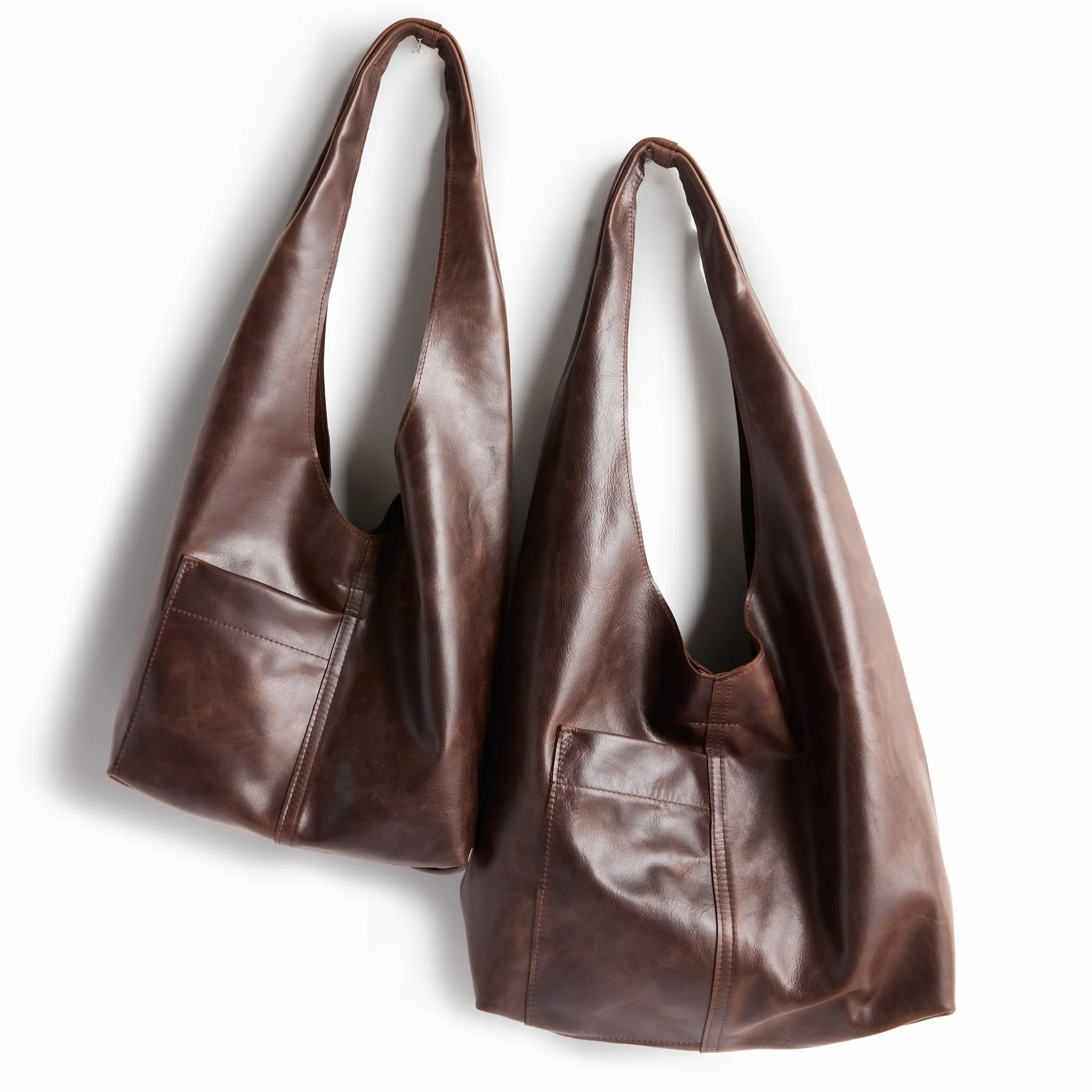 candid sling | outer pockets | small