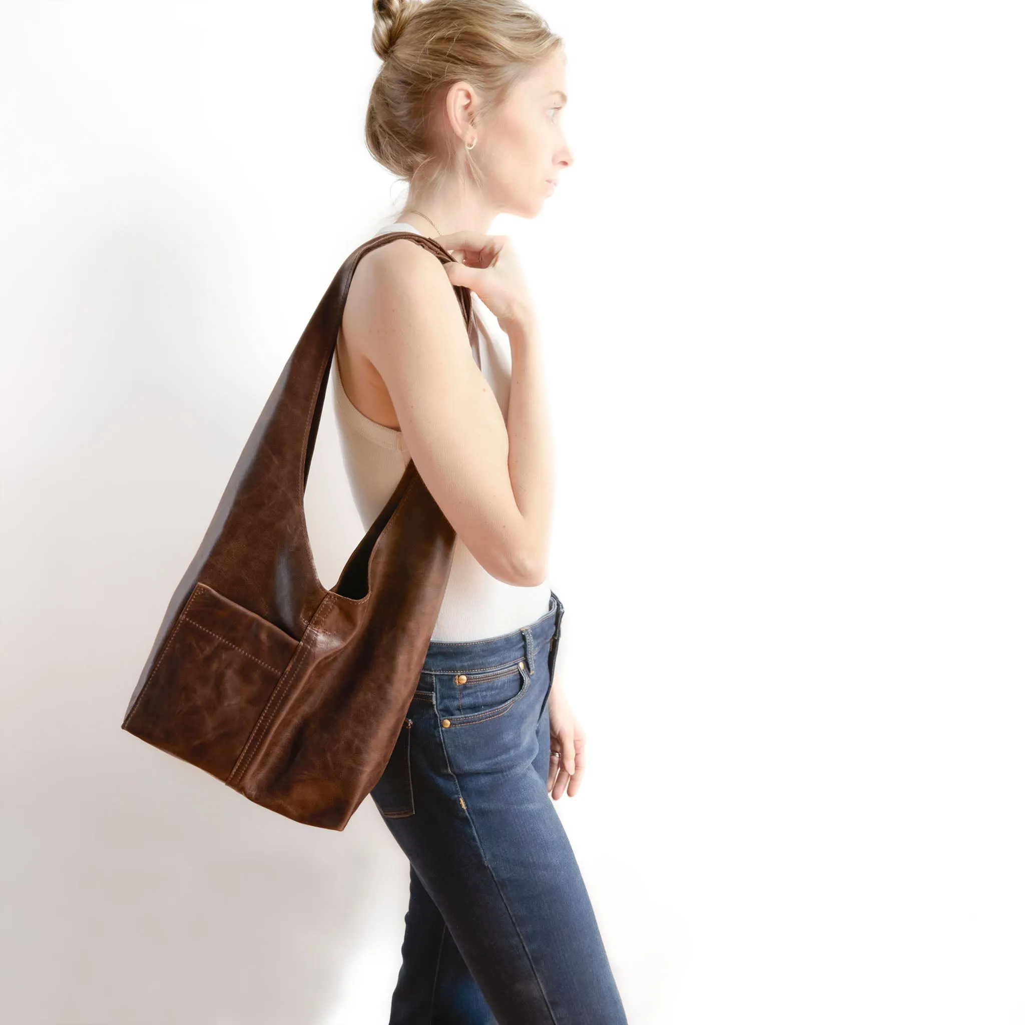 candid sling | outer pockets | small