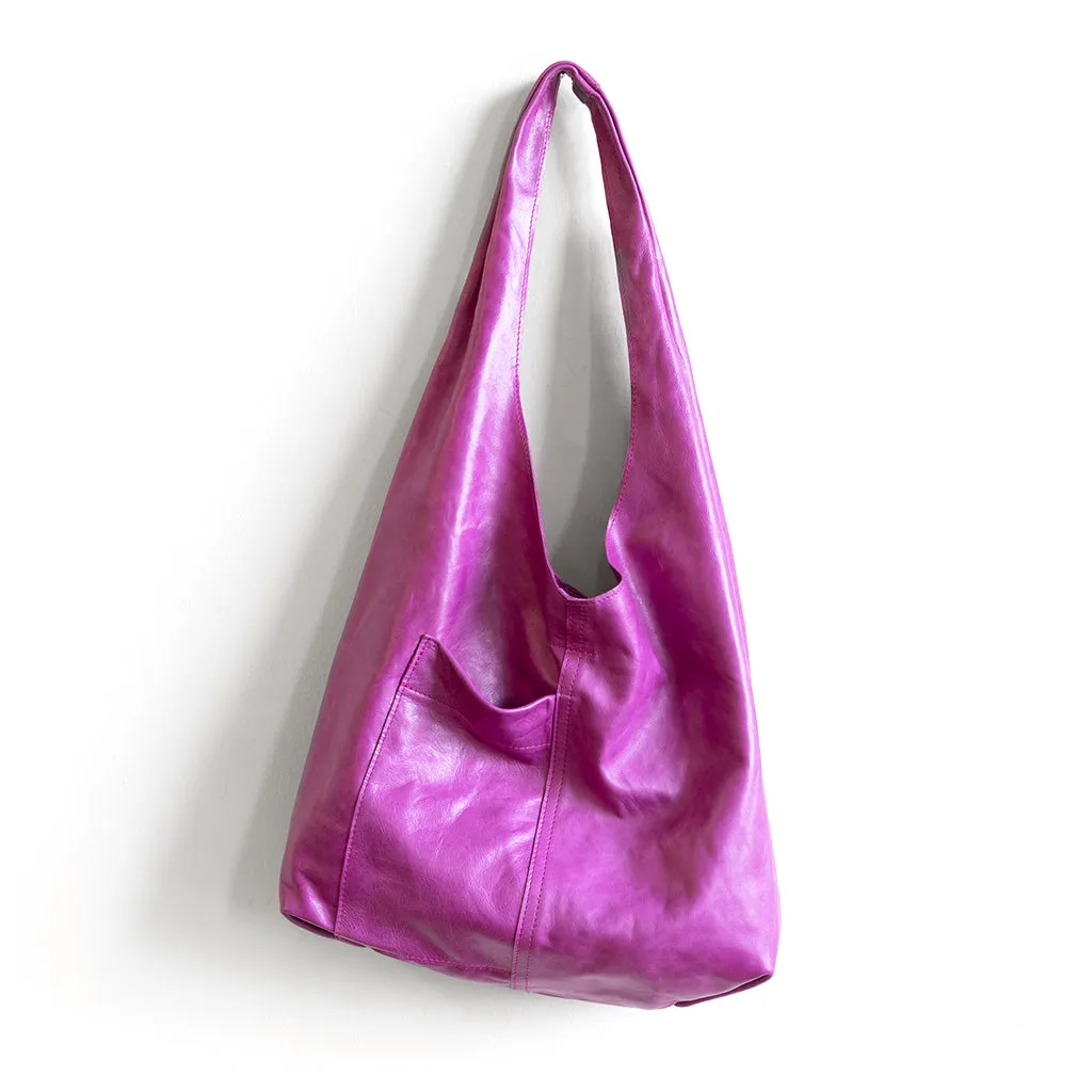 candid sling | outer pockets | small
