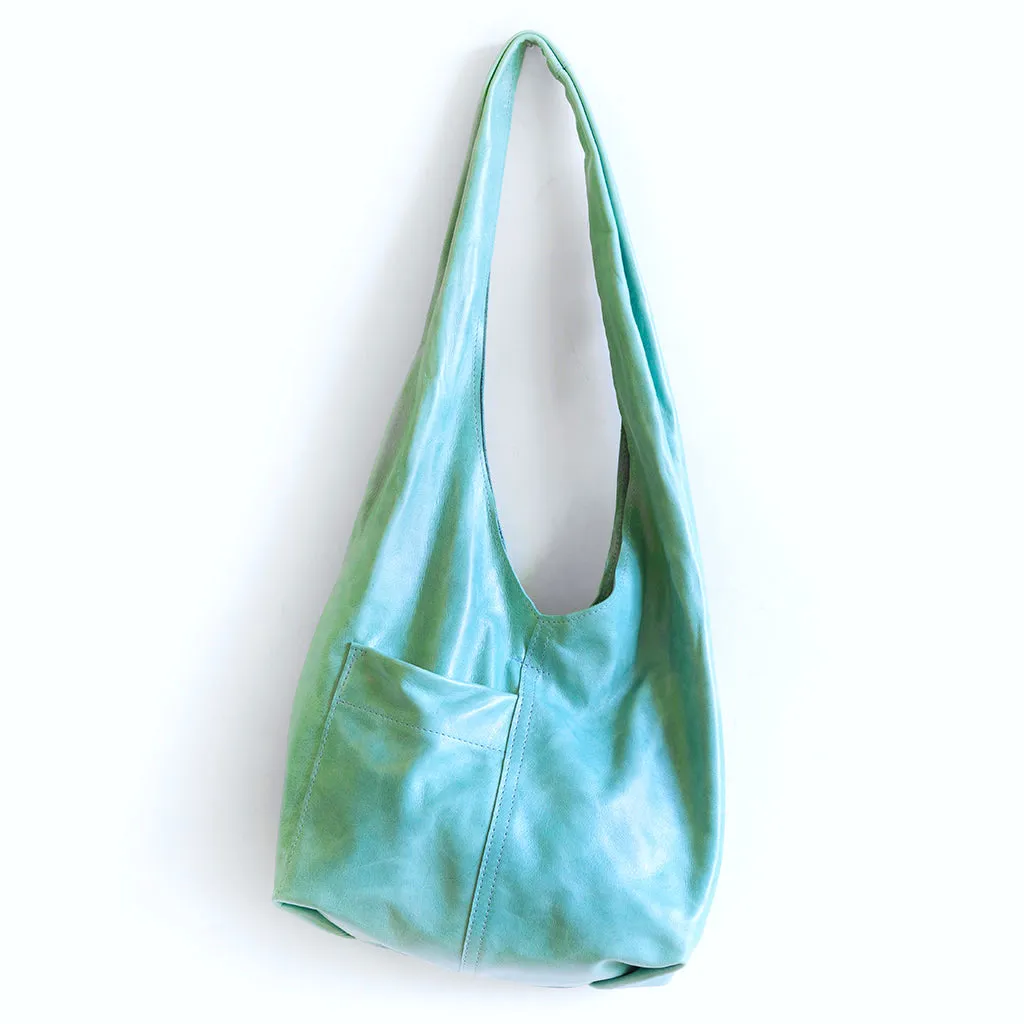 candid sling | outer pockets | small