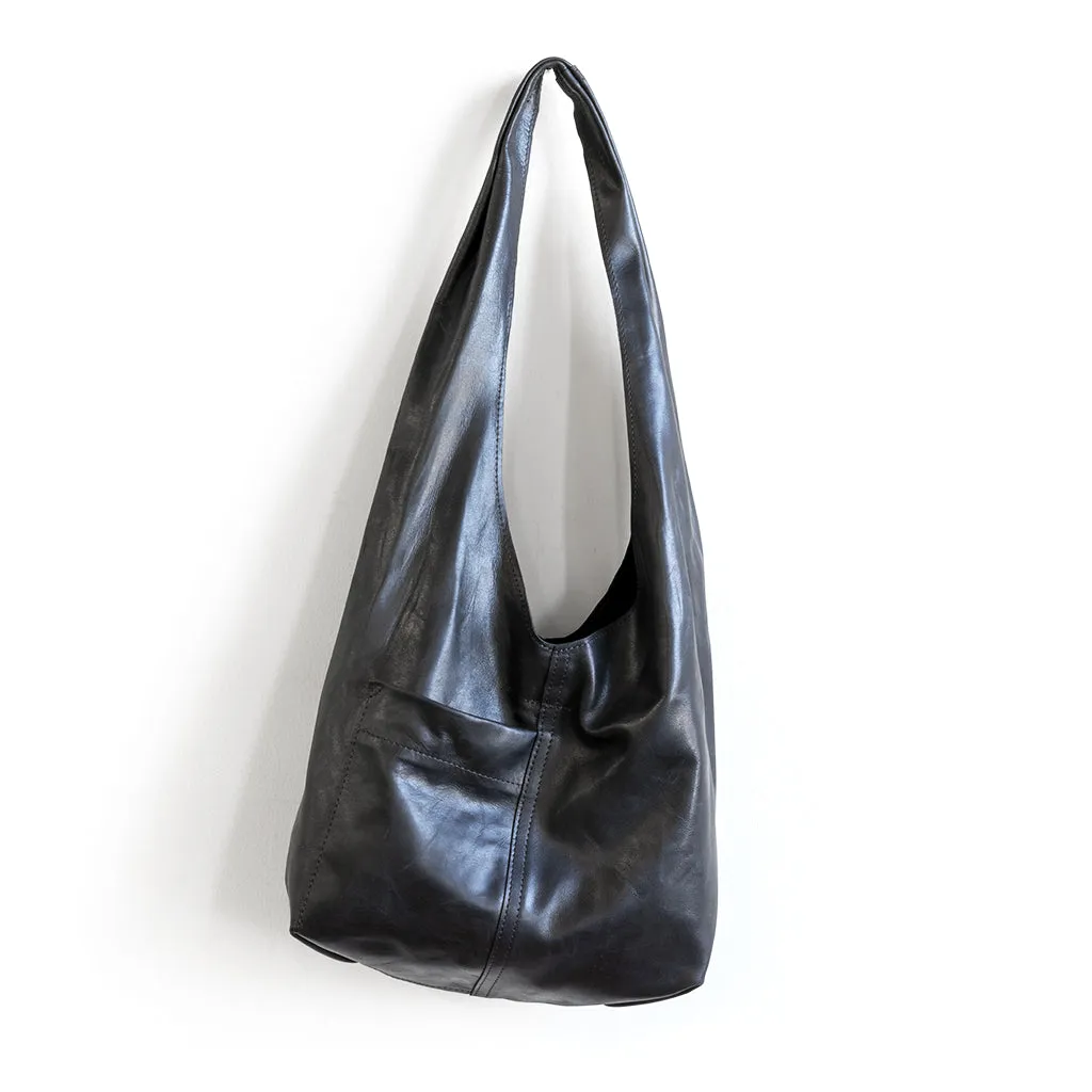 candid sling | outer pockets | small