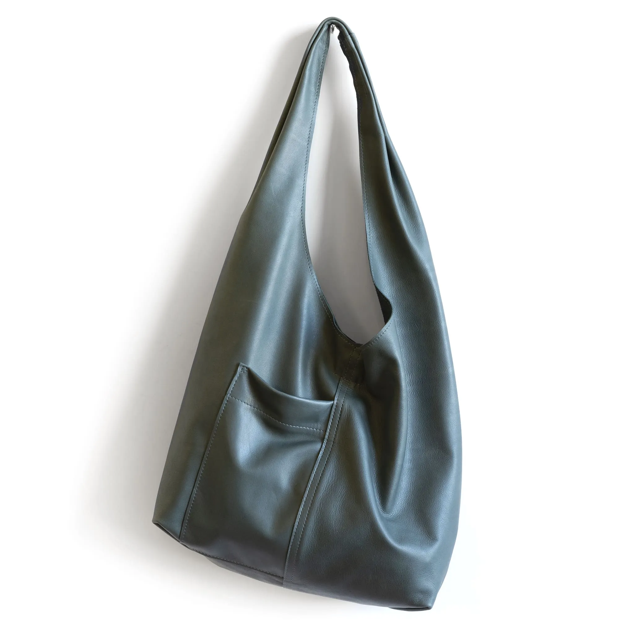 candid sling | outer pockets | small