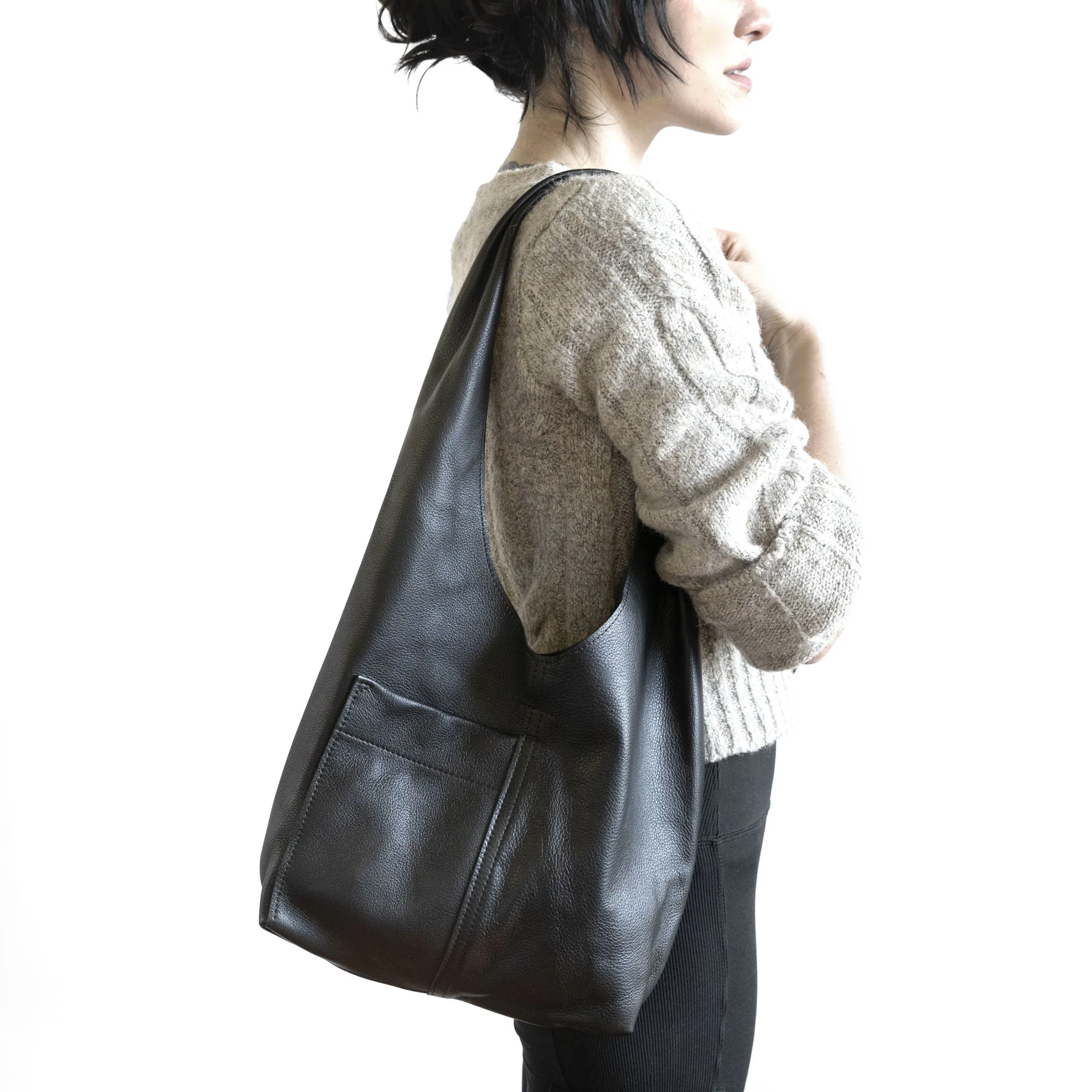 candid sling | outer pockets | small