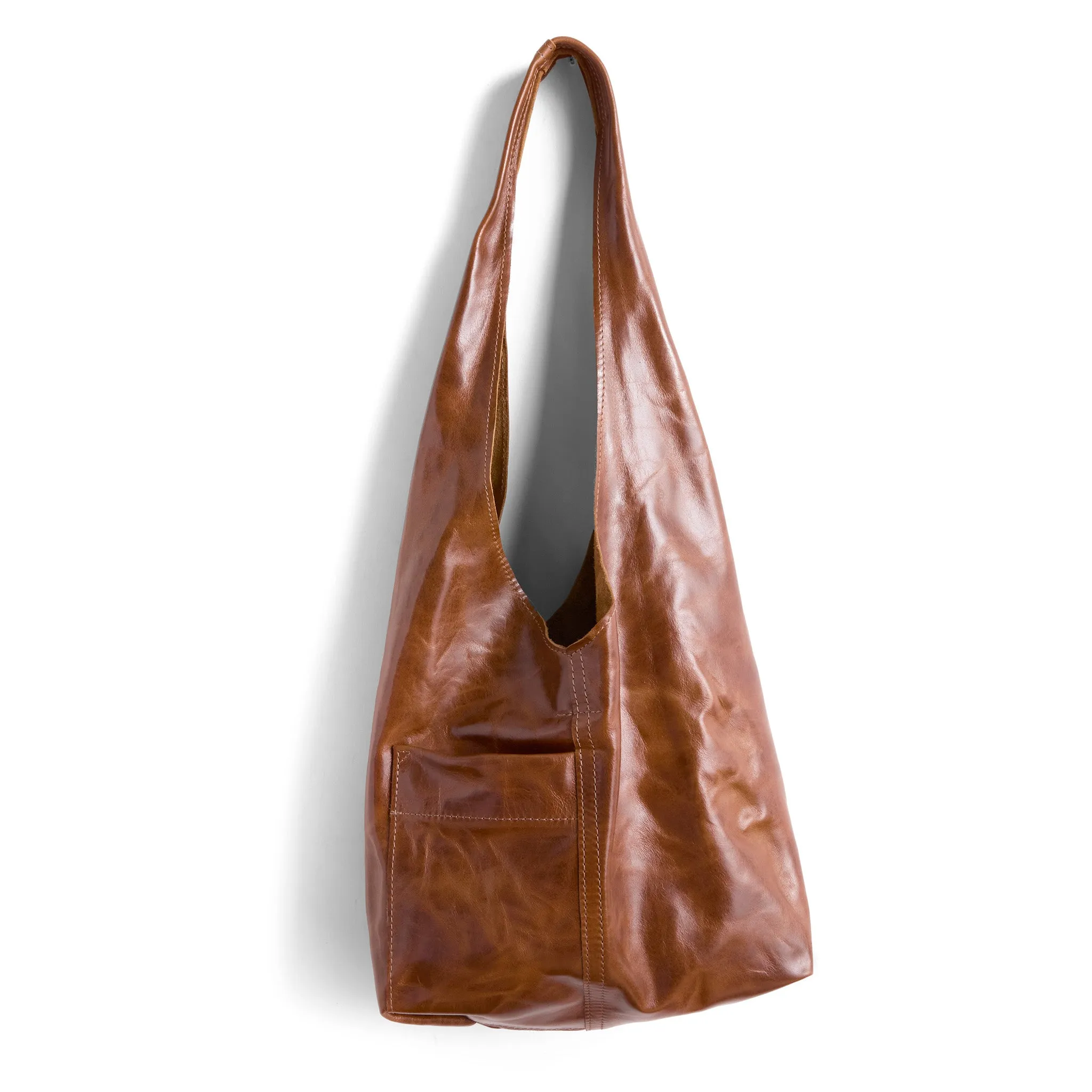 candid sling | outer pockets | small