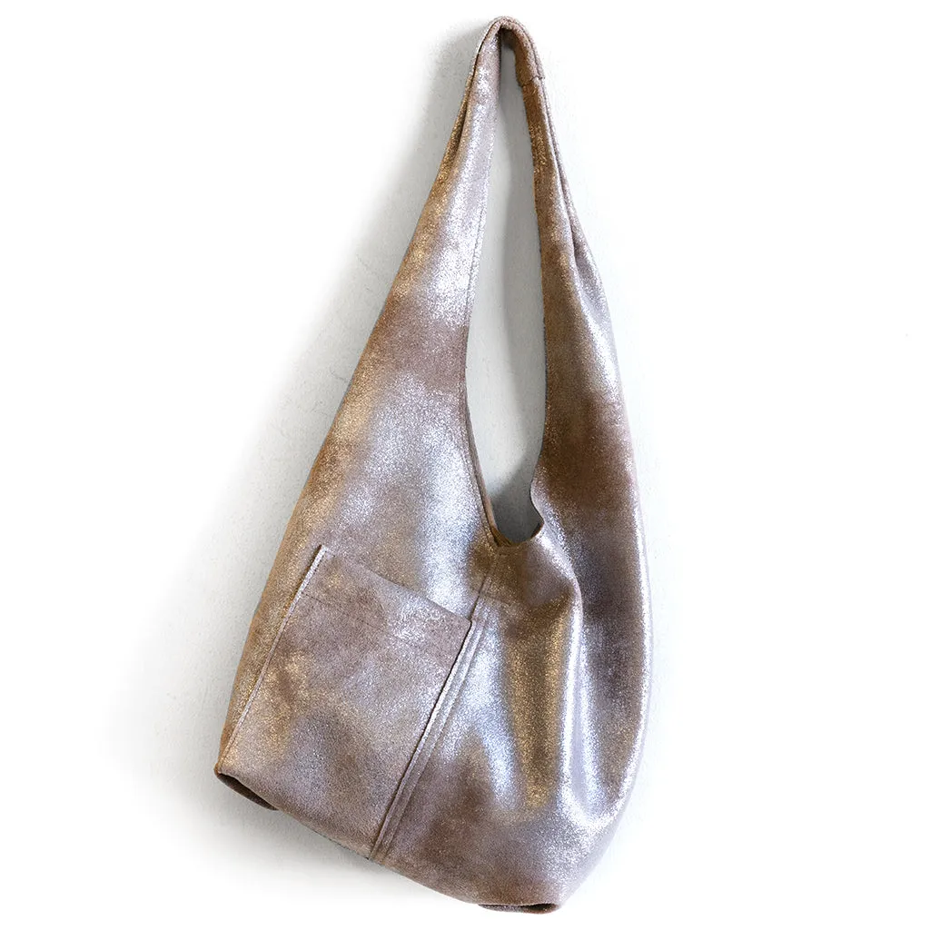 candid sling | outer pockets | small