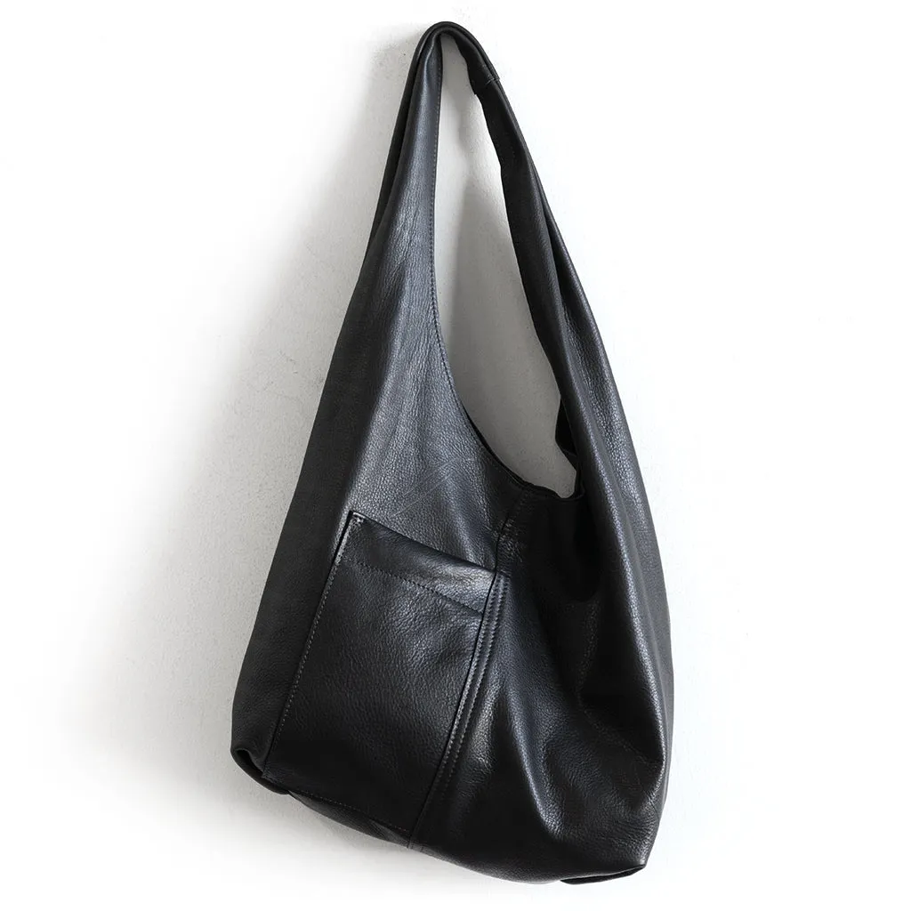 candid sling | outer pockets | small