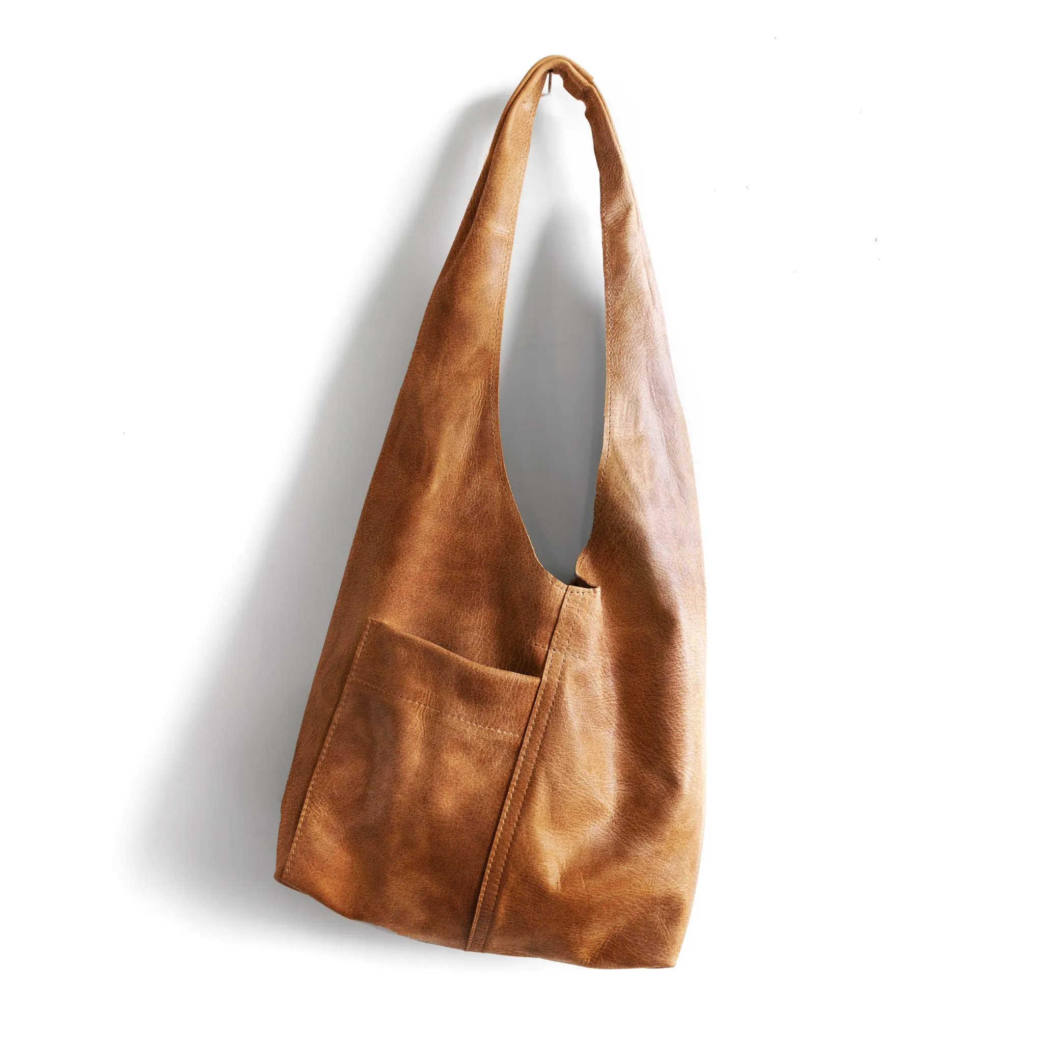 candid sling | outer pockets | small