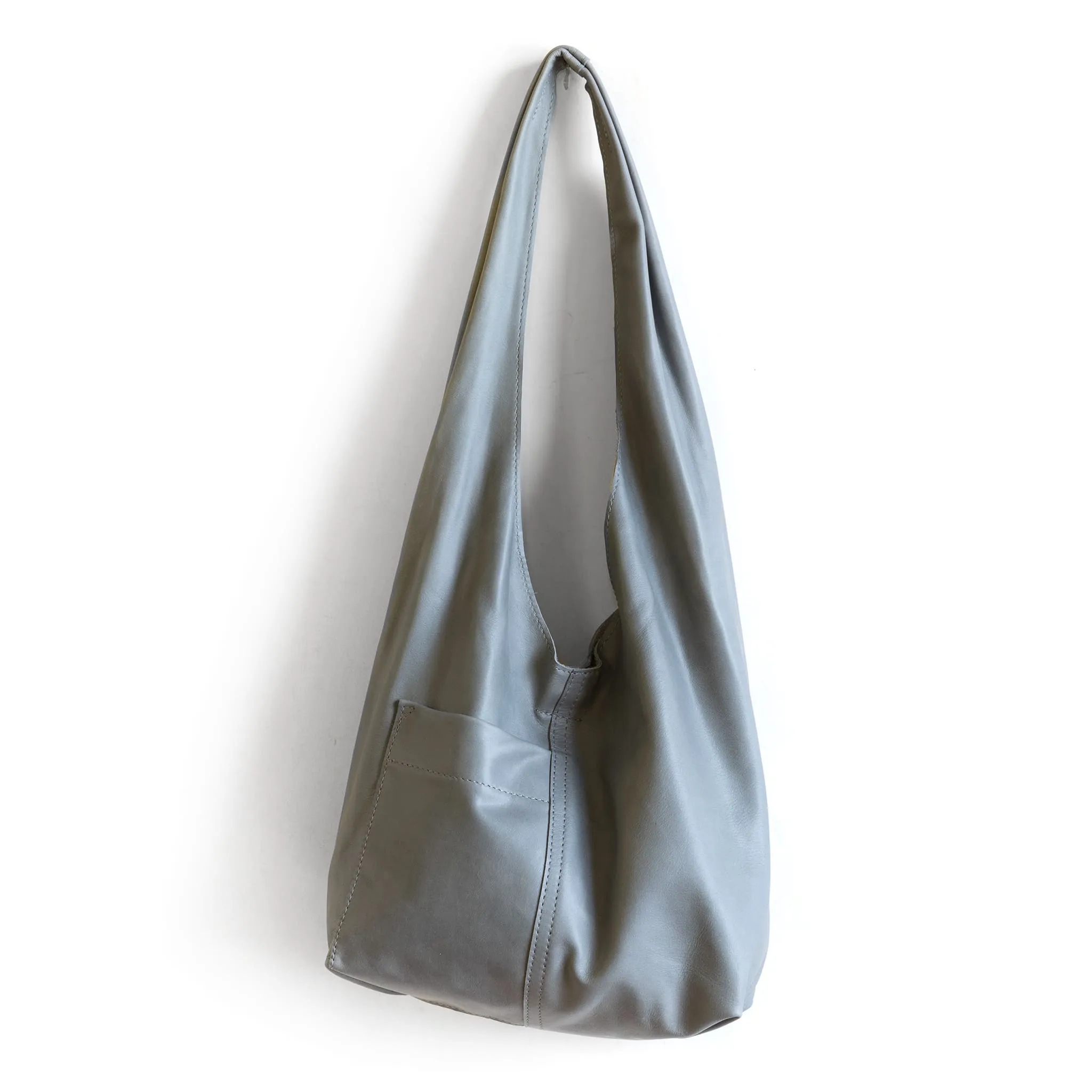 candid sling | outer pockets | small