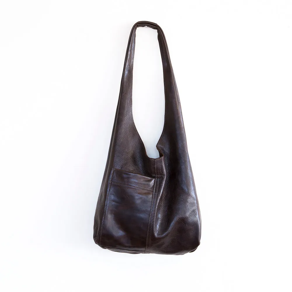 candid sling | outer pockets | small