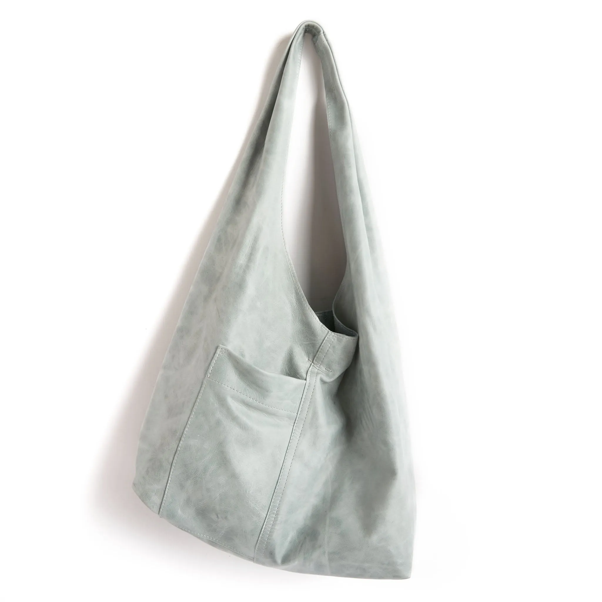 candid sling | outer pockets | small