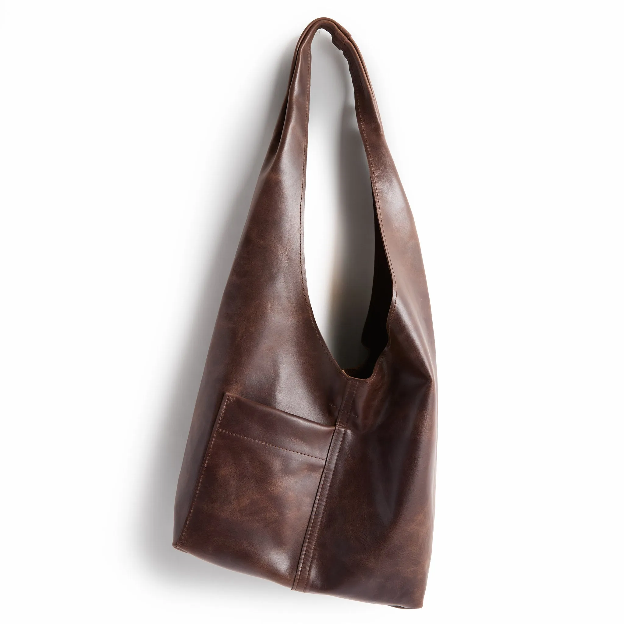 candid sling | outer pockets | small