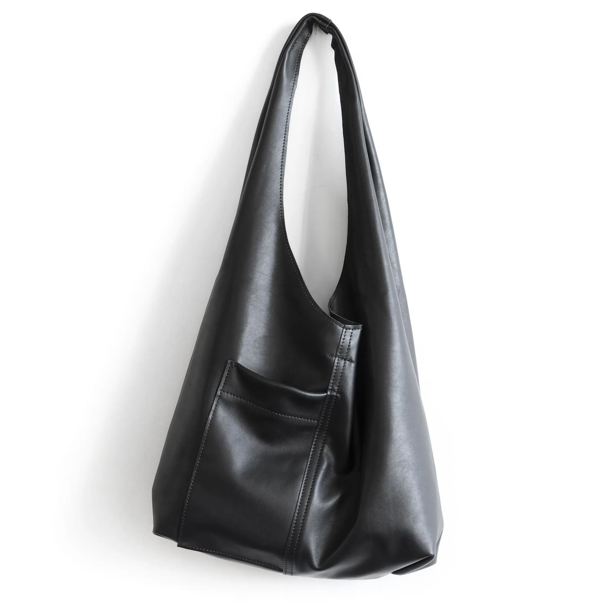 candid sling | outer pockets | small