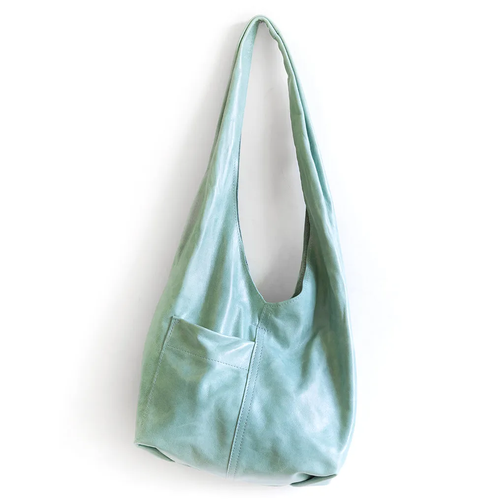 candid sling | outer pockets | small