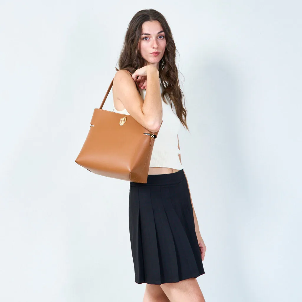 Sleek handbag with metallic accent wholesale