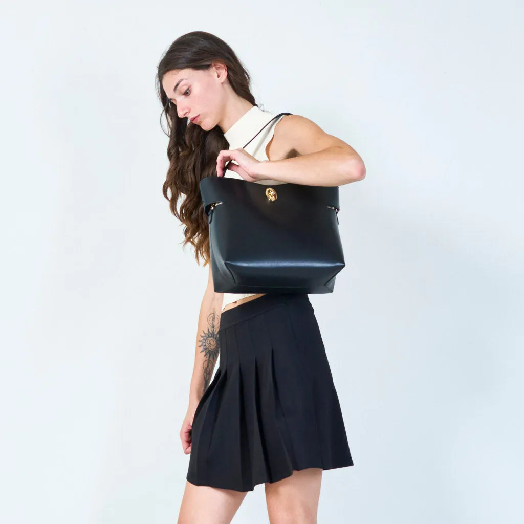Sleek handbag with metallic accent wholesale