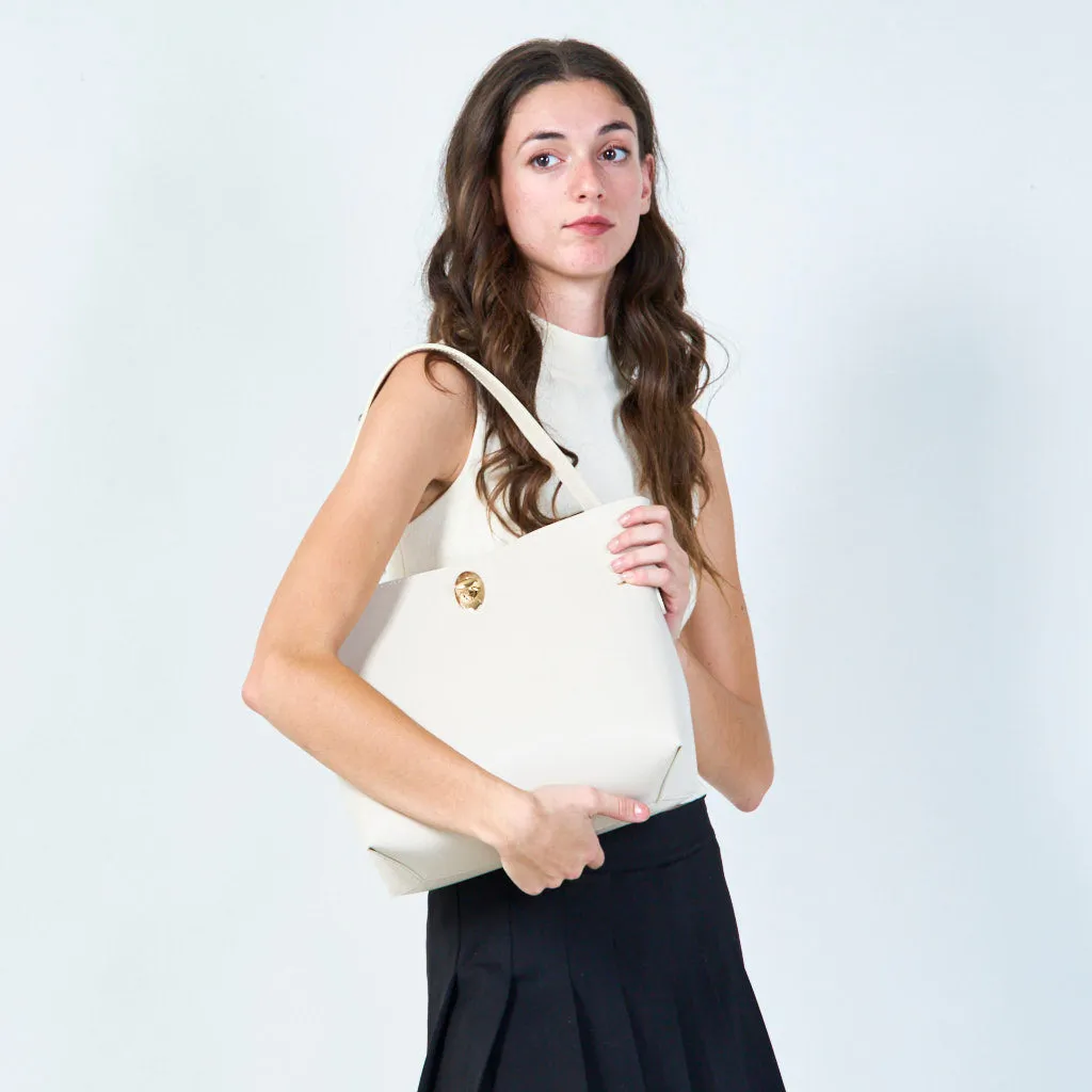 Sleek handbag with metallic accent wholesale