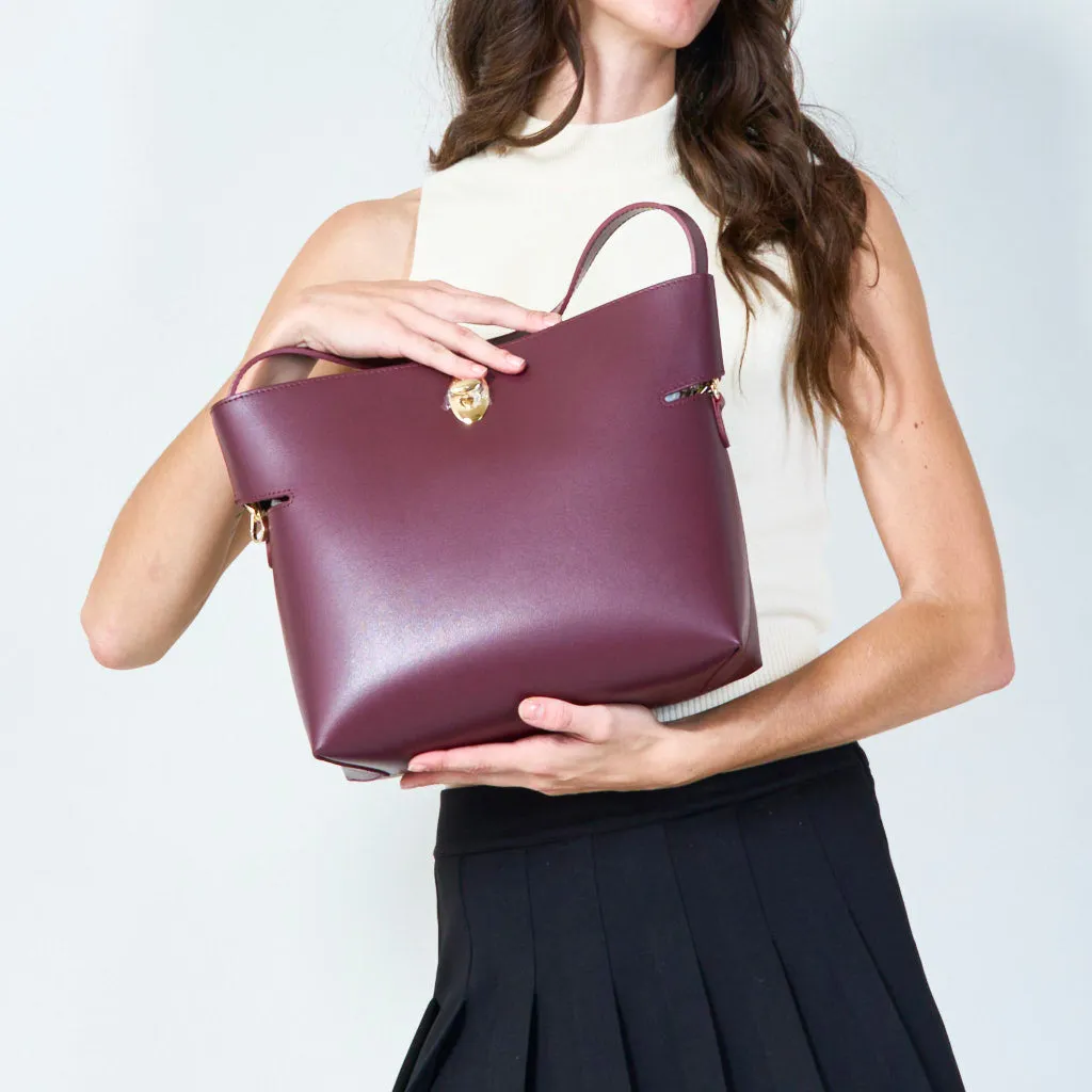 Sleek handbag with metallic accent wholesale